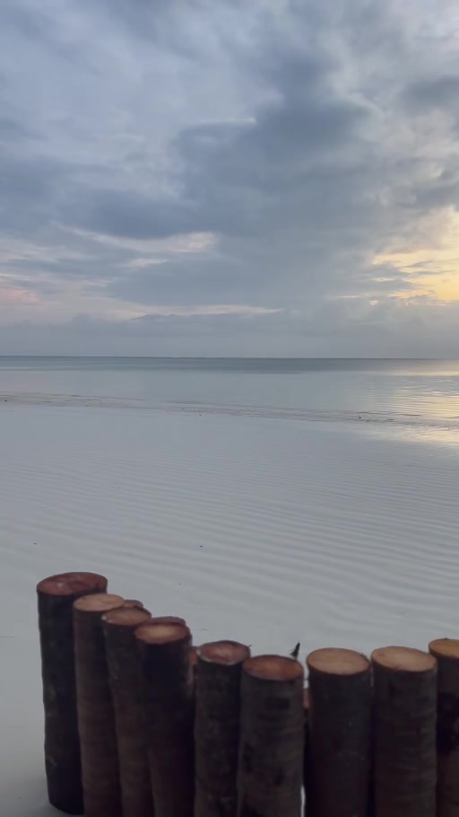 Kiwenga Beach at low tide, taken from Libby’s video still