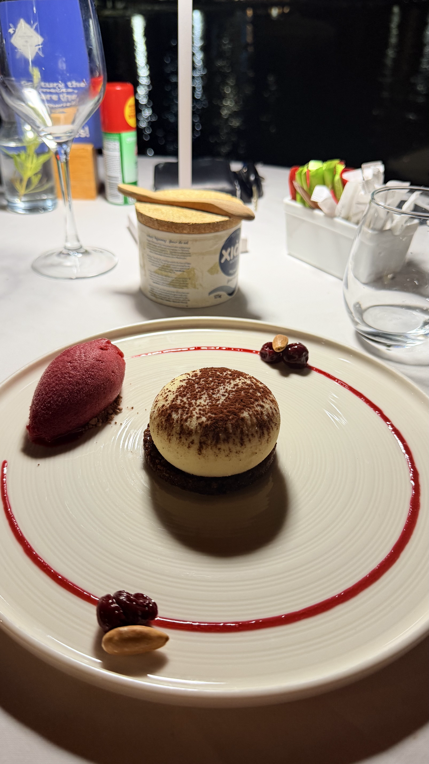 Tiramisu with anthotyro mousse, Greek coffee ganache, sour cherry, carob crumble and sour cherry-tsipouro sorbet