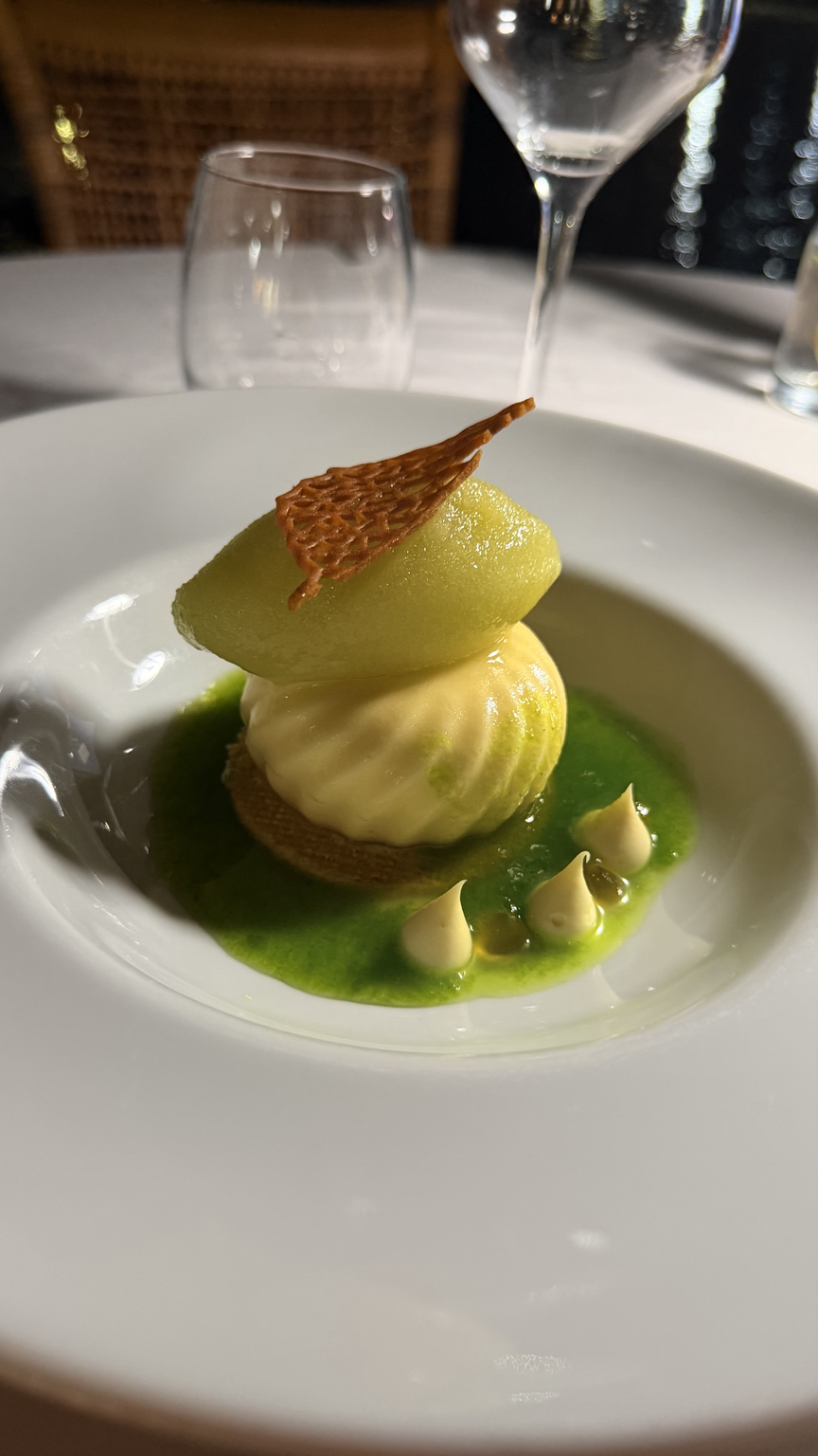 Yogurt-Chamomile dessert with yogurt mousse, almond, lemongrass namelaka, chamomile gel, cucumber sauce and melon sorbet
